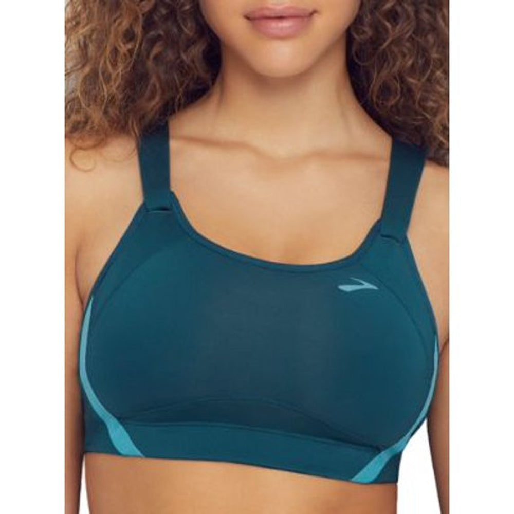 Brooks Jubralee sports bra in teal green worn by model