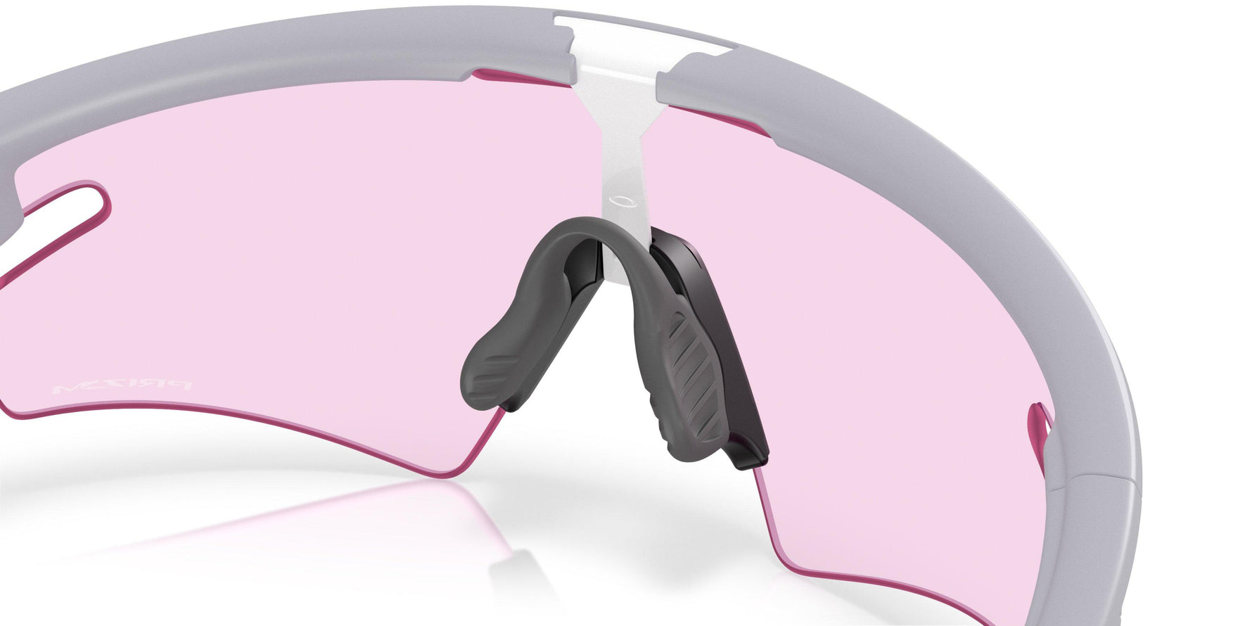 Oakley sunglasses with matte gray frame and pink tinted Prizm lens