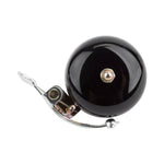 Black bicycle bell with chrome mounting bracket and striker mechanism