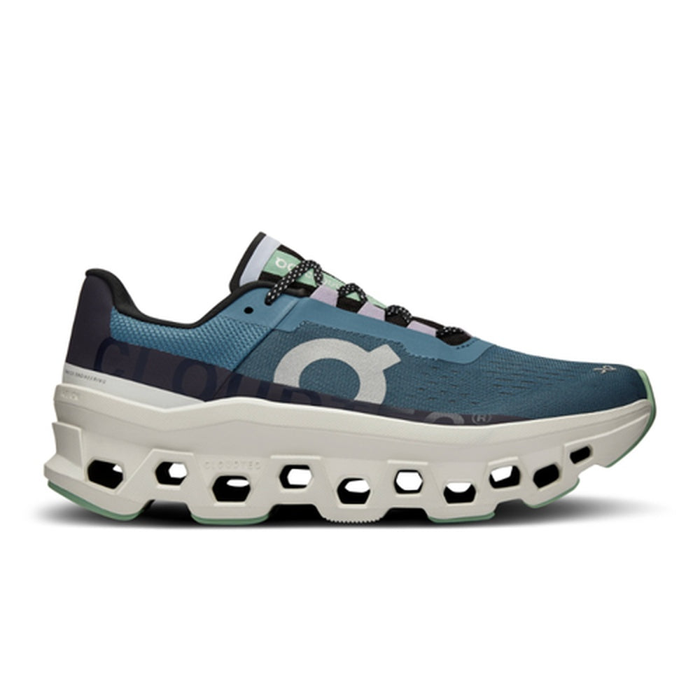 On Cloudmonster running shoes in dust/vapor colorway with distinctive cloud sole technology