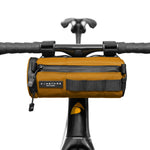 ALMSTHRE Compact Bar Bag in California Gold mounted on bicycle handlebars
