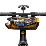 Yellow Almsthre compact bicycle handlebar bag with snacks and water bottle attached