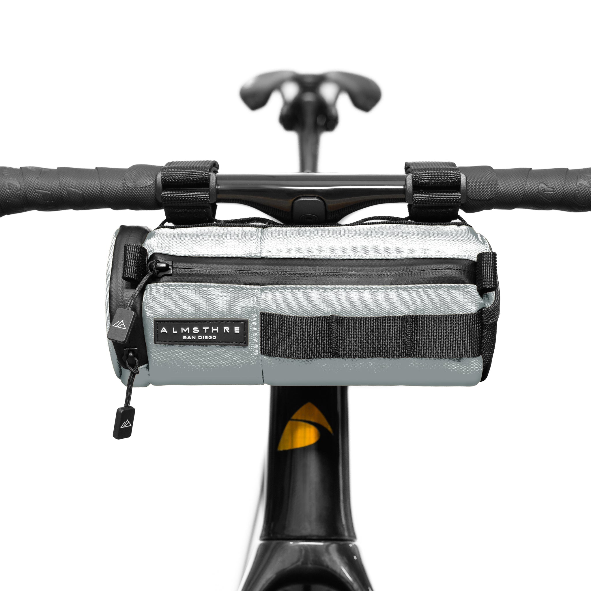 ALMSTHRE compact bar bag in sterling silver mounted on bicycle handlebars