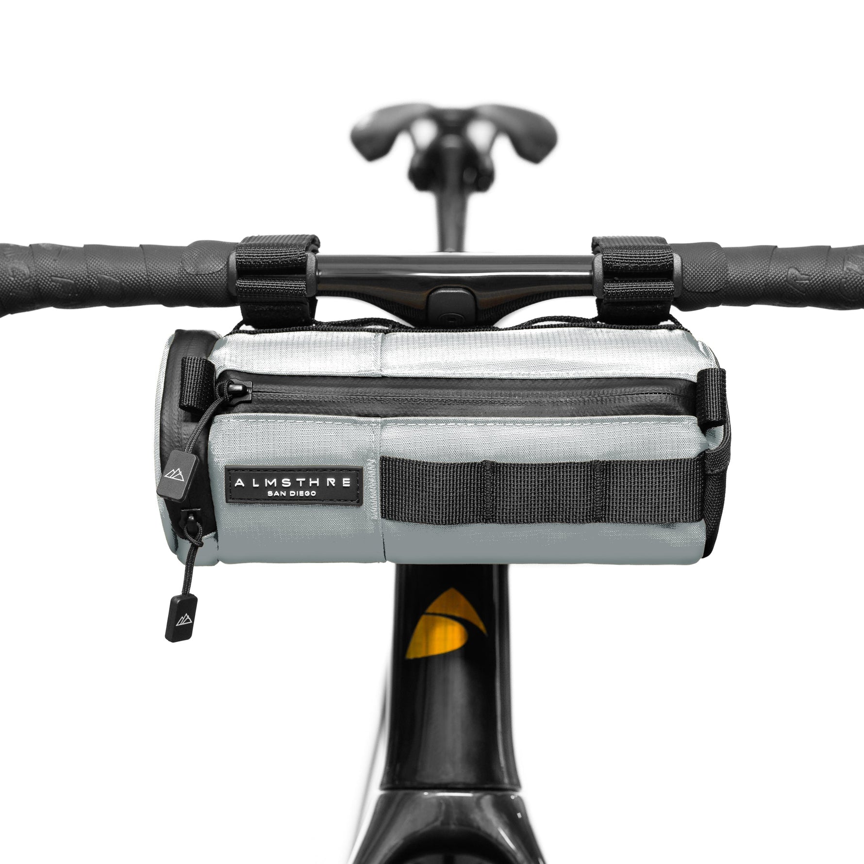 ALMSTHRE compact bar bag in sterling silver mounted on bicycle handlebars