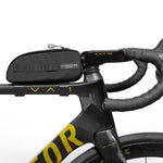 Black ALMSTHRE top tube bike bag mounted on aerobars with clean studio background