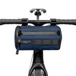 Navy blue Almsthre bicycle handlebar bag mounted on bike handlebars with black straps