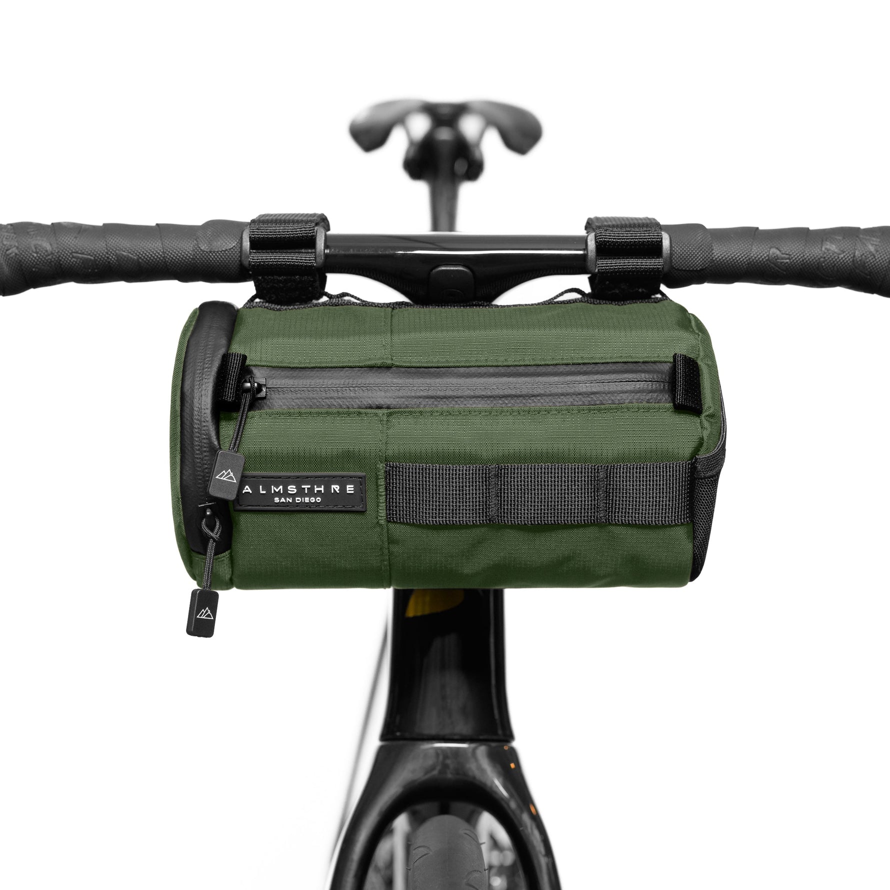 Almsthre Signature Bar Bag in hunter green attached to bicycle handlebars
