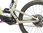 Clear AMS frame guard protection film installed on white mountain bike frame