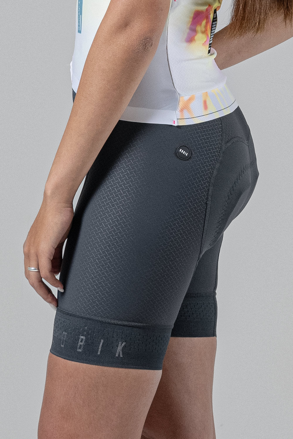 Gobik Absolute 5.0 women's bib shorts in slate gray with professional studio photography