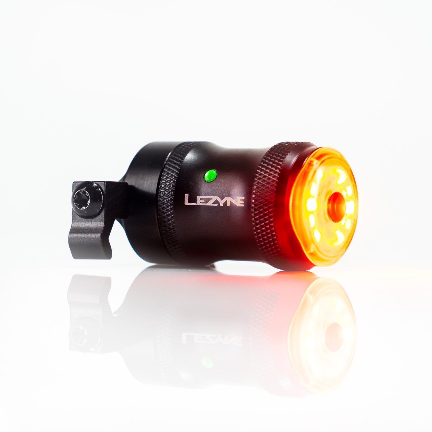 Lezyne bicycle rear light with red LED illuminated, black and red body