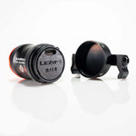 Lezyne black bike light with mounting bracket on white studio background