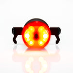 Lezyne bike tail light with bright red and yellow LED pattern illuminated