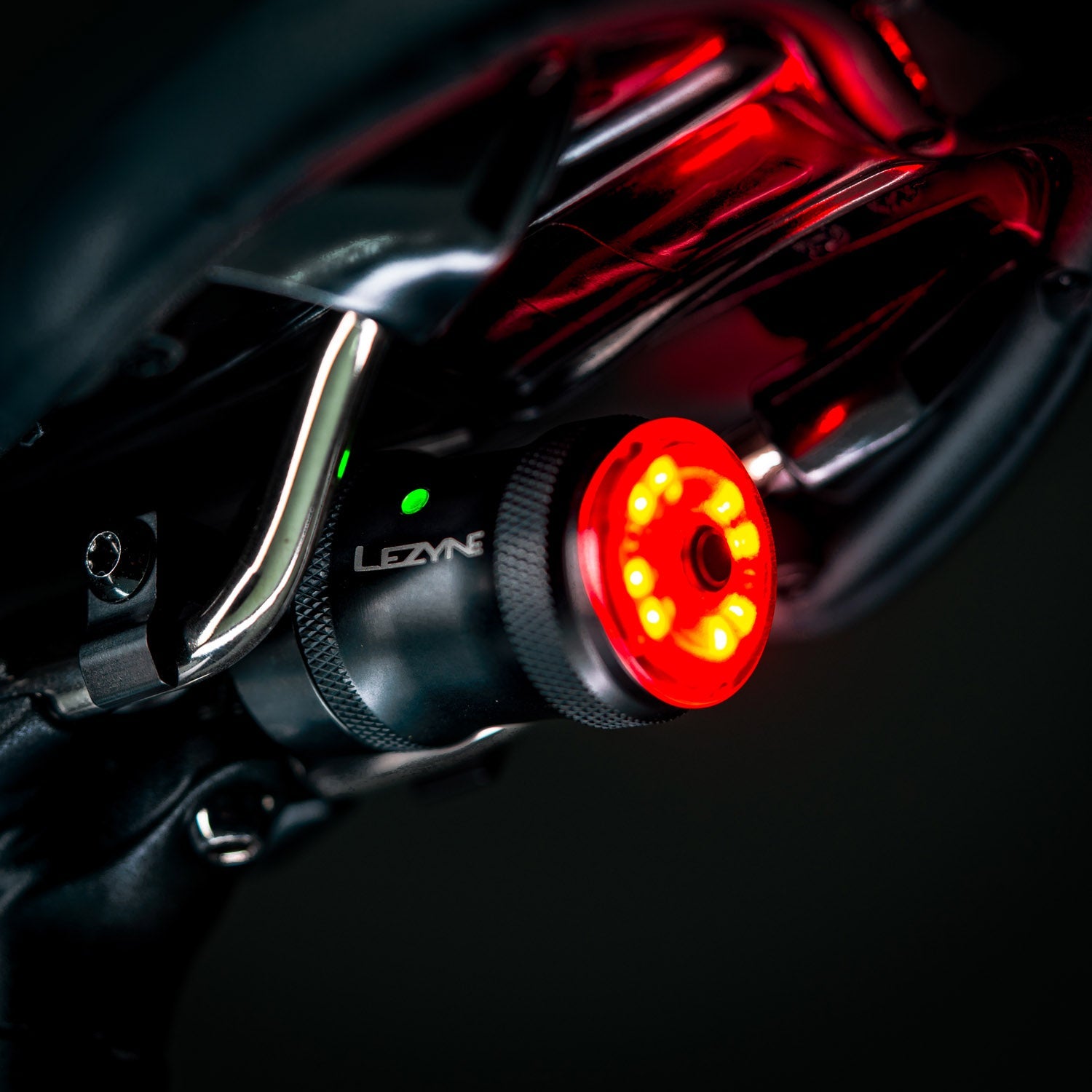 Lezyne bike rear light with red LED illumination showing smart alert features