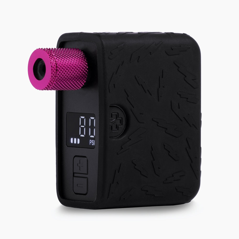 Muc-Off AirMach Mini Pro electric tire inflator with digital display showing 80 PSI
