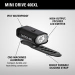 Lezyne Mini Drive 400XL black bike light with labeled features and silicone strap