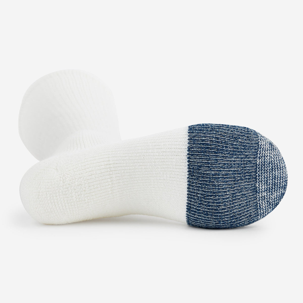 Thorlos basketball over calf socks in white with navy blue reinforced toe cushioning