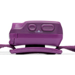 Black Diamond Cosmo headlamp top view showing power button, lock mechanism, and tilt hinge in purple