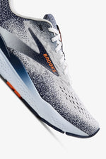 Brooks Ghost 16 running shoe in white and grey with orange branding