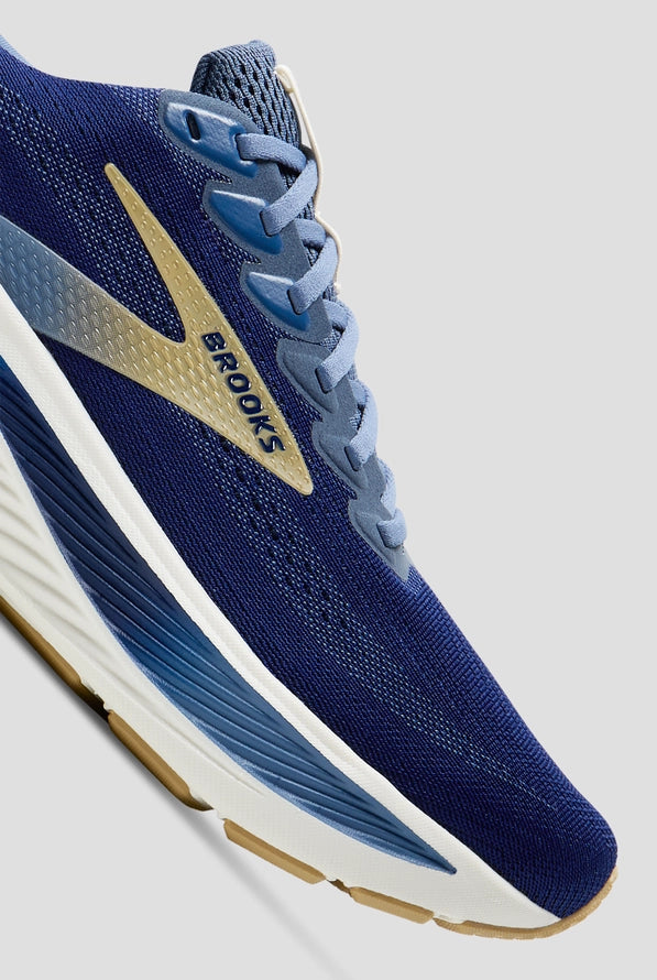 Brooks Ghost 17 running shoe in navy blue with light blue and gold accents