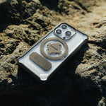 Rokform Crystal Case for iPhone 15 Plus with clear transparent design on rocky surface