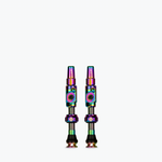 Two Muc-Off Big Bore Lite Tubeless Presta Valves with rainbow iridescent finish