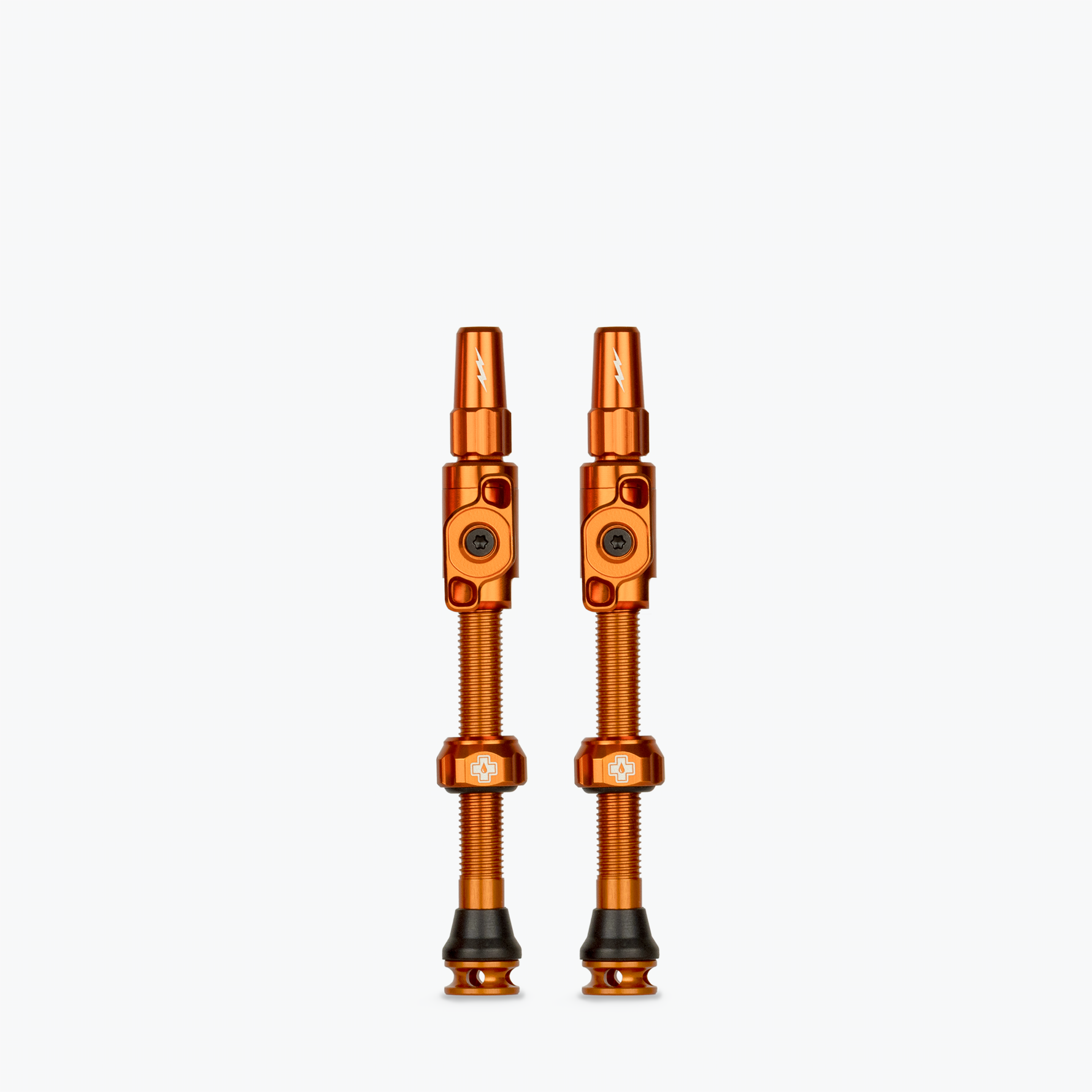 Muc-Off Big Bore Lite Tubeless Presta Valves in orange anodized finish
