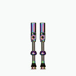 Two Muc-Off Big Bore Hybrid Tubeless Presta Valves with rainbow iridescent finish