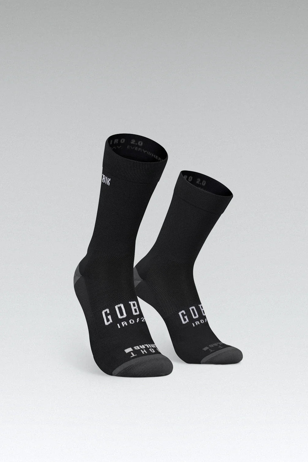 Black Gobik Iro 2.0 cycling socks with white logo text on clean background