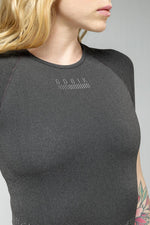 Woman wearing Gobik Women's Base Layer Limber in basalt gray color