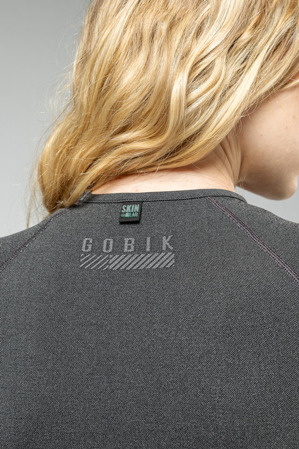 Gobik Women's Base Layer Limber in basalt grey worn by blonde model