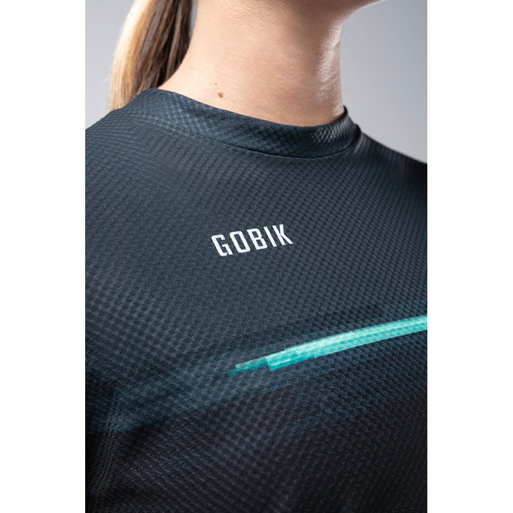 Gobik Terrain long sleeve women's shirt in dark gray with textured pattern and teal stripe