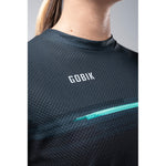 Gobik Terrain long sleeve women's shirt in dark gray with textured pattern and teal stripe
