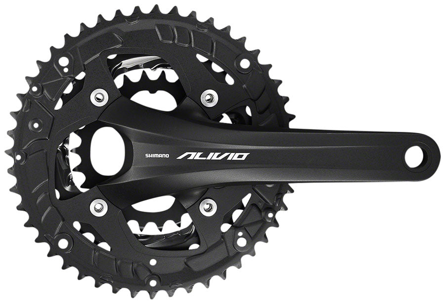 Shimano Alivio black crankset with dual chainrings on white background