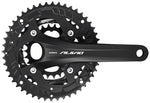 Shimano Alivio black triple chainset with three chainrings on white background