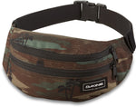 Dakine camouflage hip pack with adjustable black strap and multiple zippered compartments