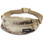 Dakine hip pack in desert camouflage pattern with adjustable tan strap