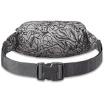 Dakine hip pack in gray with black floral pattern and adjustable waist strap