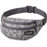 Dakine hip pack with gray background and black tropical leaf pattern design