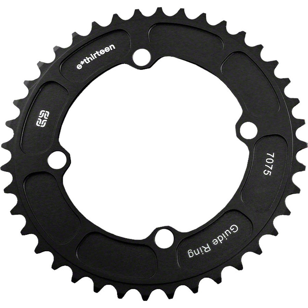 e*thirteen black bicycle chainring with teeth and mounting holes on white background
