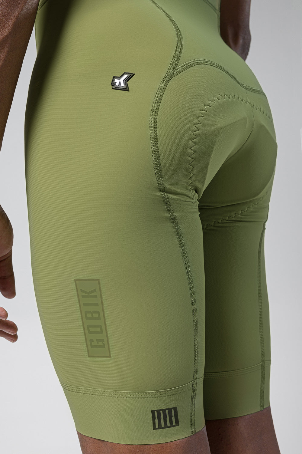 Gobik Matt Men's Bibshort in olive green with logo details and side panels