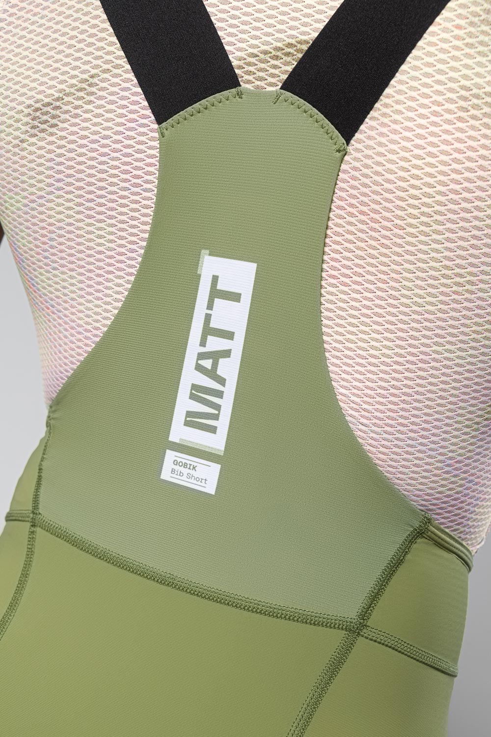 Gobik Matt 2.0 Bib Shorts in olive green with professional studio lighting