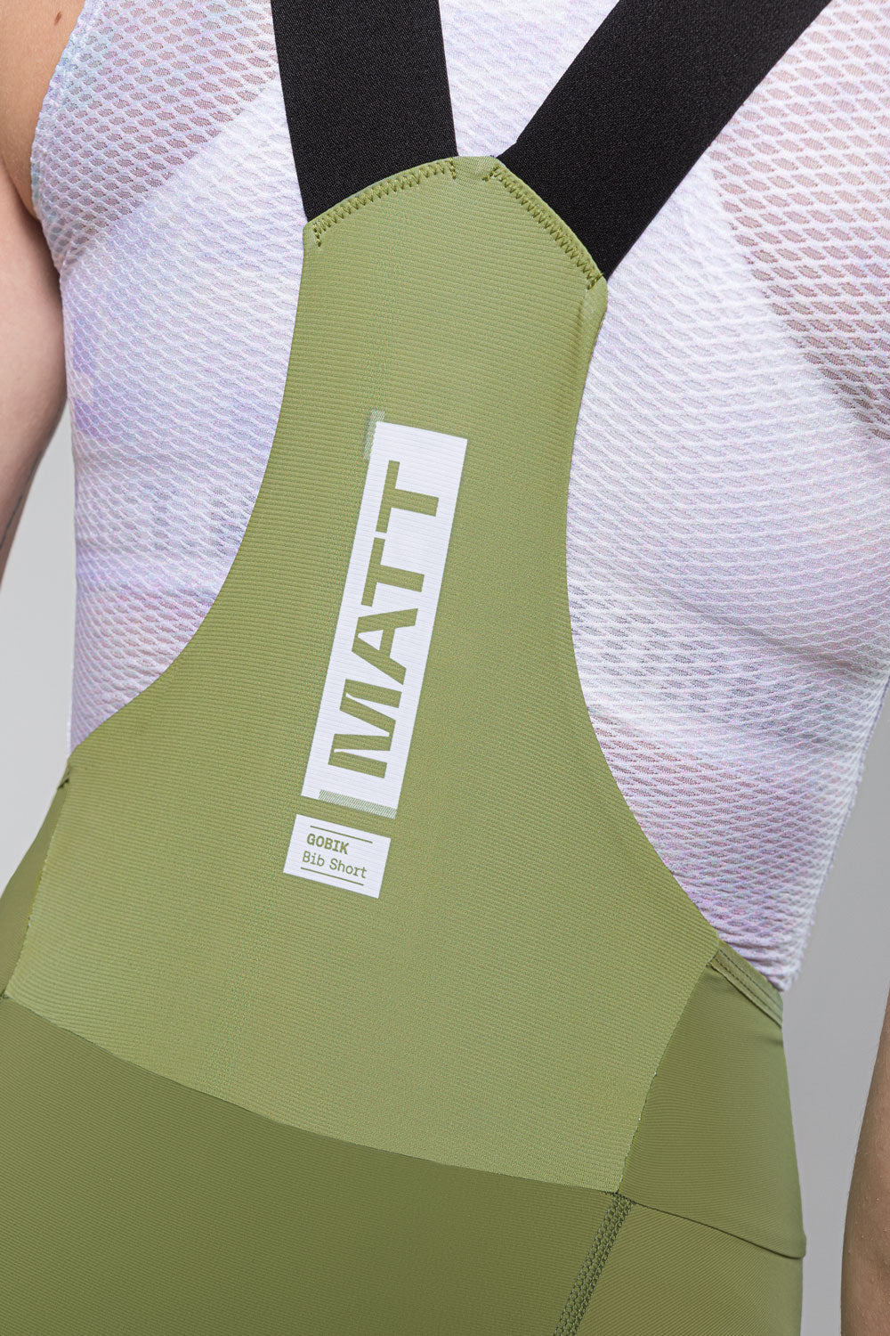 GOBIK women's olive green cycling bib shorts with white logo and black straps