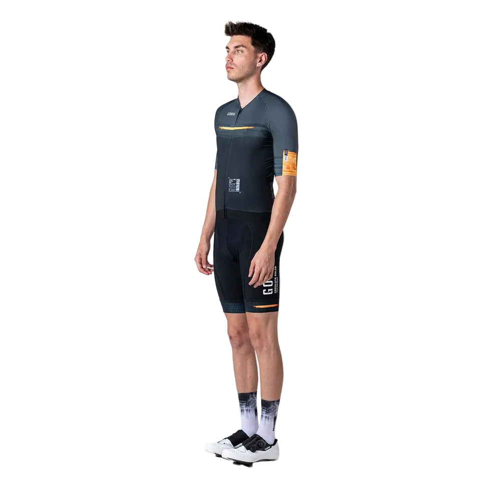 Male model wearing Gobik CX Pro cycling jersey and shorts in dark teal colorway