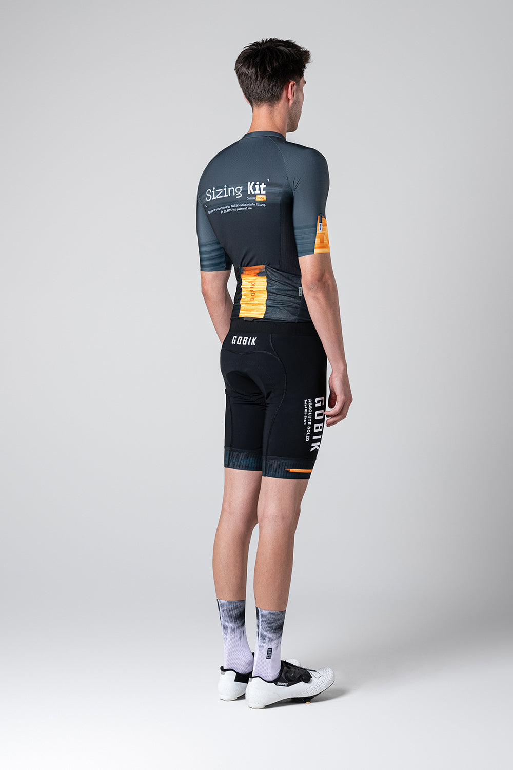 Gobik CX Pro cycling jersey and shorts in Hack colorway, rear view on model