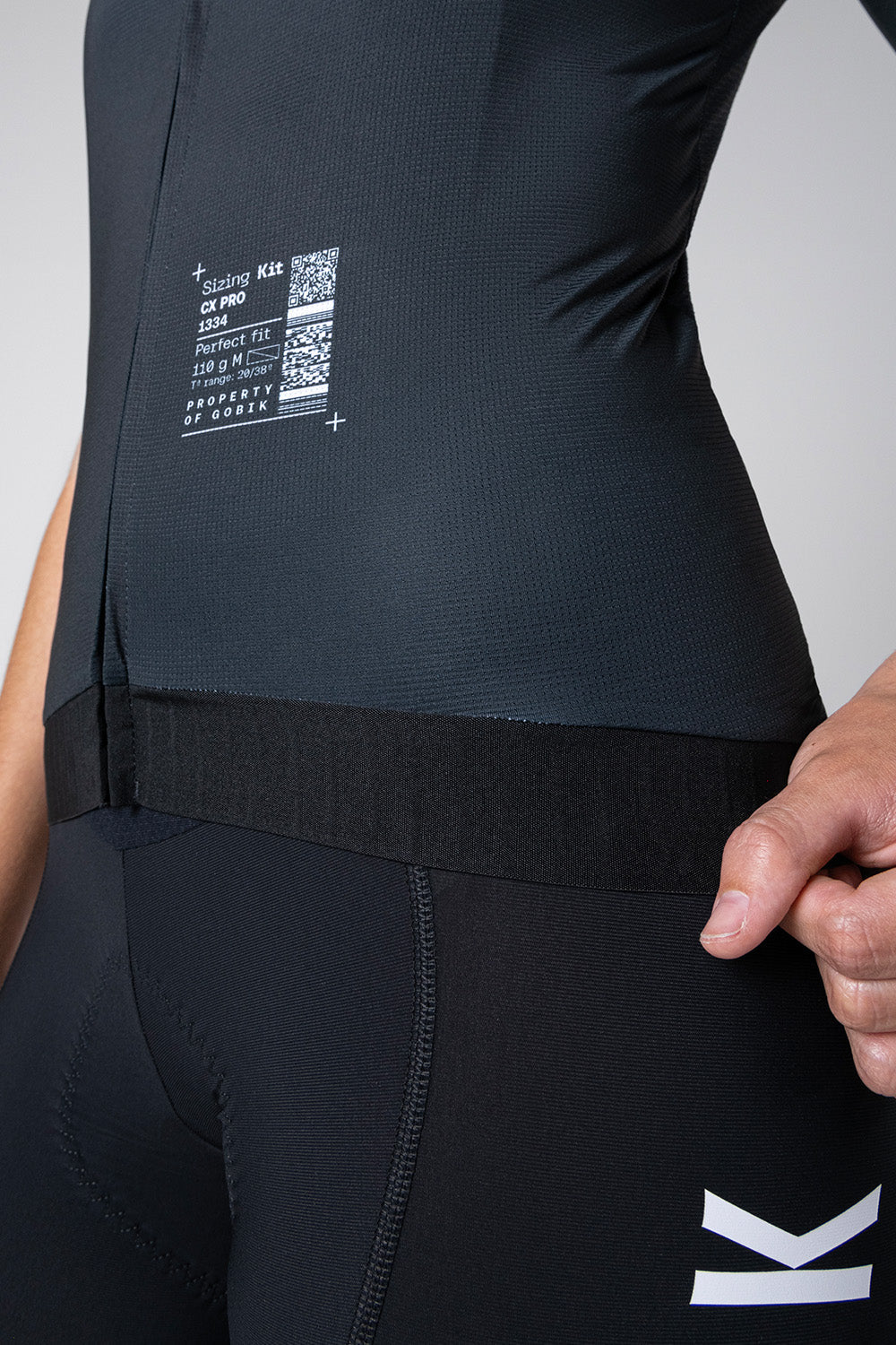 Gobik CX Pro jersey in dark gray with sizing kit label detail