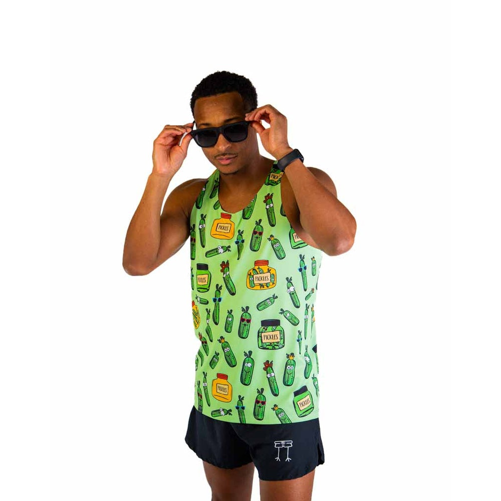Man wearing green pickle-patterned performance singlet with sunglasses against white background