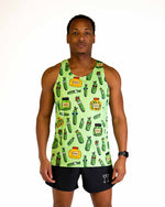 Man wearing light green tank top with pickle and pickle jar pattern