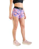 ChicknLegs women's purple split shorts with pink pig pattern and black waistband