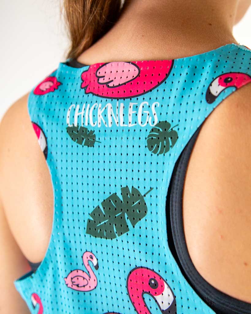 ChicknLegs blue flamingo performance singlet with tropical pattern worn by model