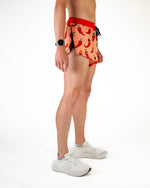 ChicknLegs men's orange split shorts with red chili pepper print